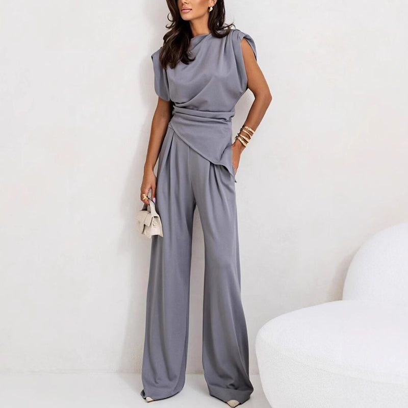 Set elegant din două piese de damă într-o culoare uni