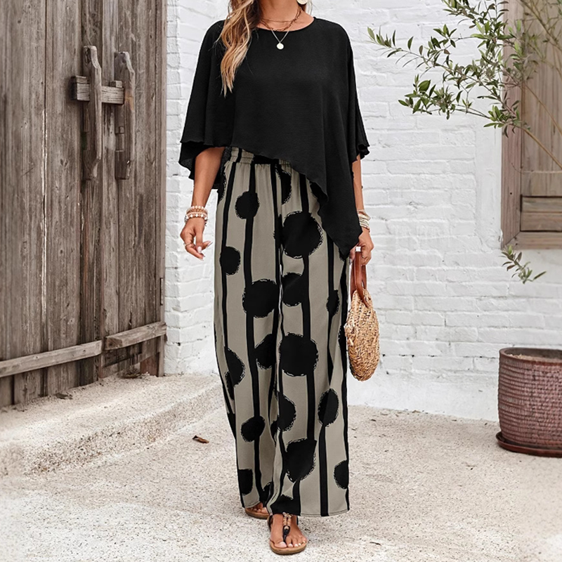 Set elegant cu top cu mâneci trei sferturi și pantaloni cu model