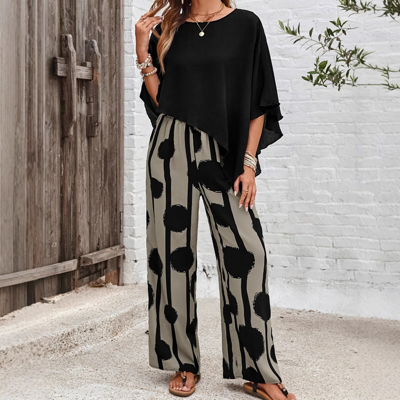 Set elegant cu top cu mâneci trei sferturi și pantaloni cu model