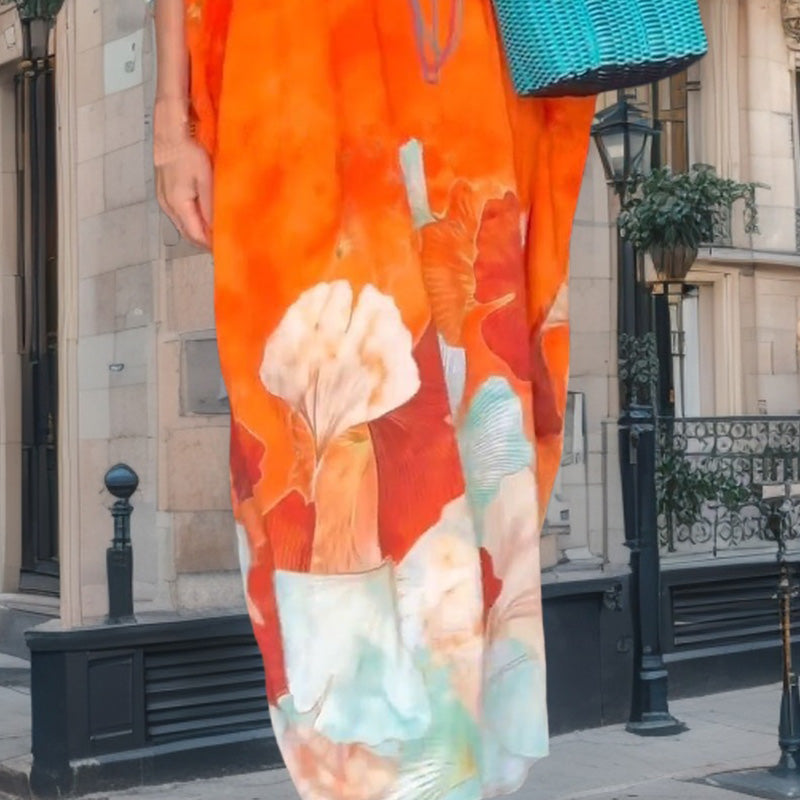 Sukienka z długim, luźnym rękawem i nadrukiem kwiatowym