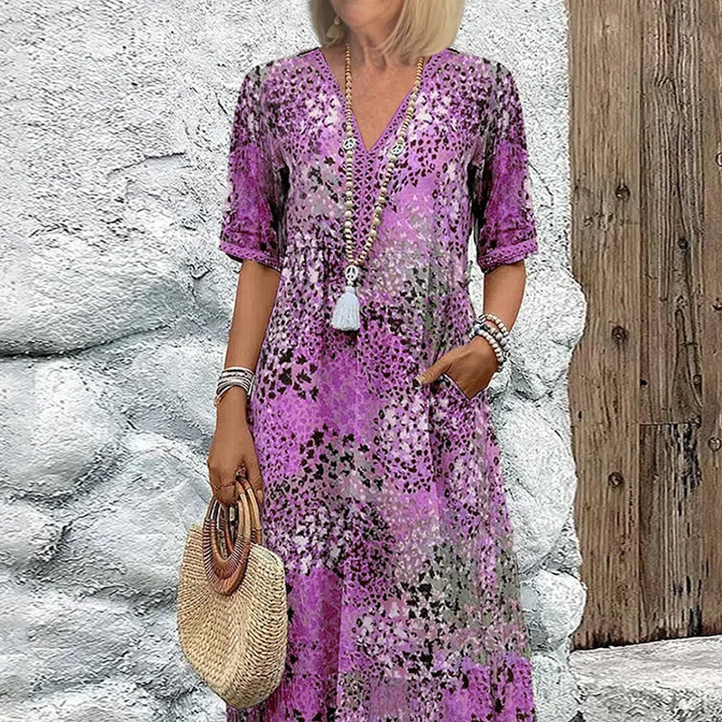 💥Damska sukienka midi z dekoltem w serek i nadrukiem