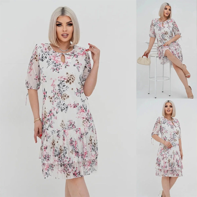 Elegancka damska sukienka plisowana z krótkim rękawem i długą spódnicą