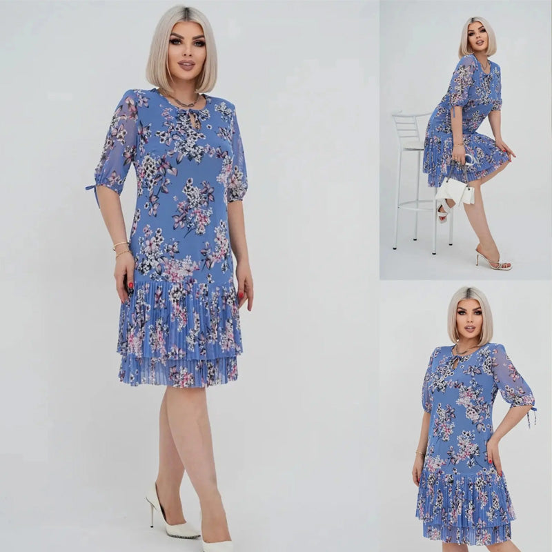 Elegancka damska sukienka plisowana z krótkim rękawem i długą spódnicą