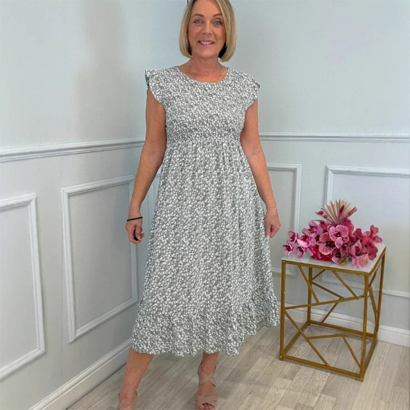 Rochie elegantă de damă cu imprimeu floral, cu talie înaltă și volane pe mânecă
