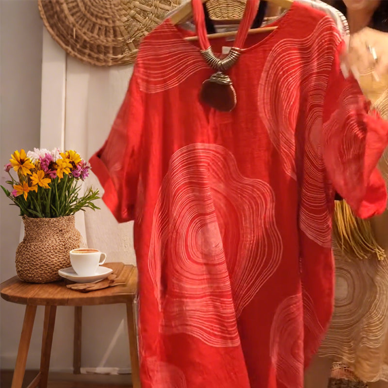 Damska sukienka z nadrukiem z dekoltem w szpic