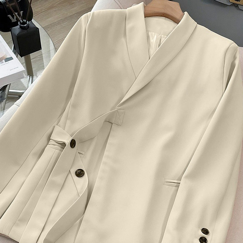 Dwuczęściowy komplet damski - marynarka z wiązaniem z przodu i spodnie z szerokimi nogawkami